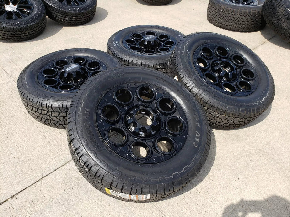 20" Ford F-250 F-350 OEM black TREMOR wheels rims 10299 10484 A/T2 tires NEW Texas Truck Tire