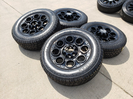 20" Ford F-250 F-350 OEM black TREMOR wheels rims 10299 10484 A/T2 tires NEW Texas Truck Tire