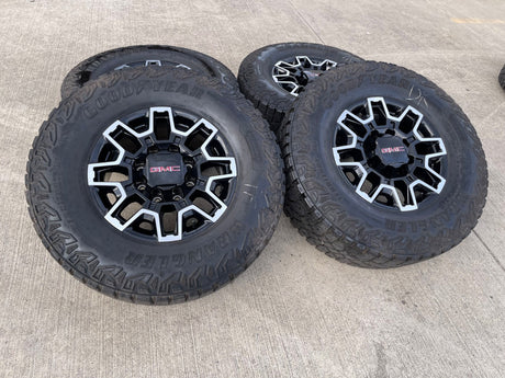 18" GMC Sierra AT4X Chevy Trail Boss 2500 OEM 14136 wheels rims GOODYEAR 35" Texas Truck Tire