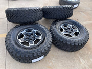 17" Jeep Wrangler RUBICON OEM wheels rims tires 9259 black TOYO 33" Texas Truck Tire