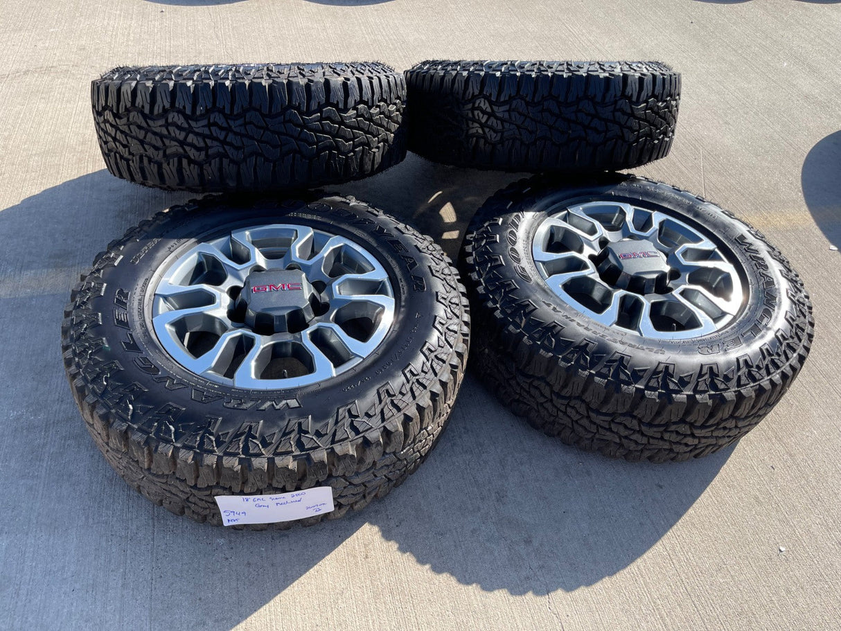 18" GMC Sierra AT4X Chevy Silverado 2500 3500 OEM 5949 wheels rims GOODYEAR A/T Texas Truck Tire