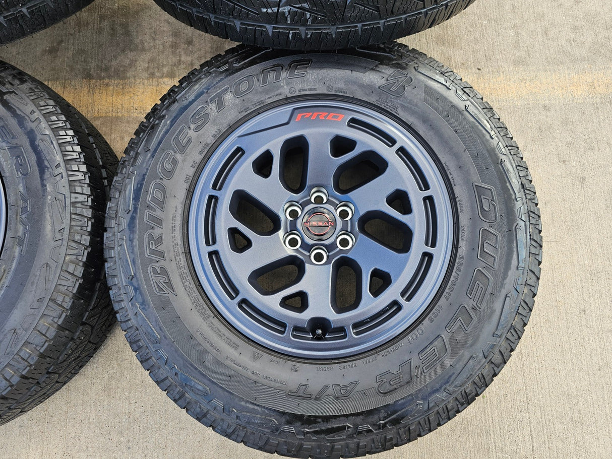17" Nissan Frontier X-PRO OEM Desert Runner wheels rims tires DUELER A/T Texas Truck Tire