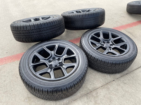 22" Dodge Ram 1500 OEM LIMITED Laramie wheels rims black 2725 2684 BRIDGESTONE Texas Truck Tire