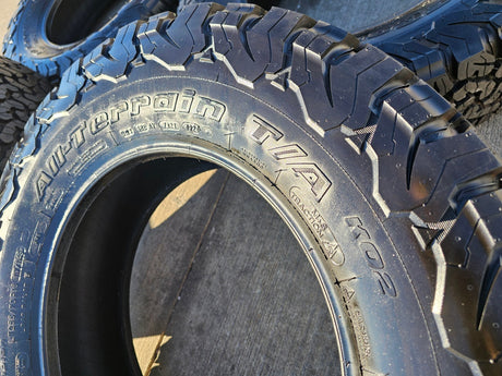 (4) 255/70/18 BFG KO2 A/T tires F-150 Sierra Tahoe Silverado NEW TAKE OFFS NEW Texas Truck Tire
