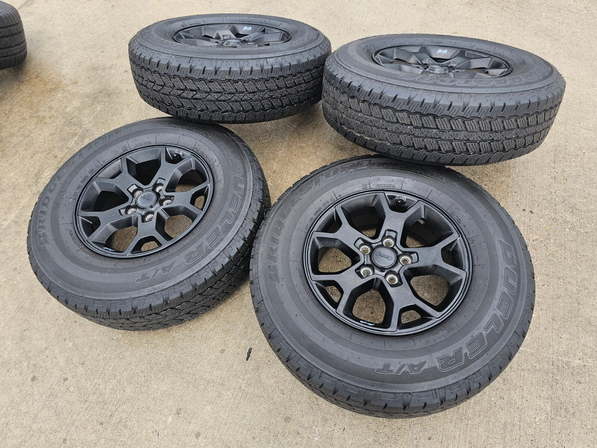 17" Jeep Wrangler Rubicon OEM 9218 wheels rims Gladiator tires DUELER A/T Texas Truck Tire