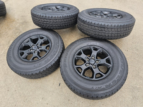 17" Jeep Wrangler Rubicon OEM 9218 wheels rims Gladiator tires DUELER A/T Texas Truck Tire