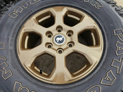 17" Ford Bronco 10384 OEM wheels rims BRONZE tires Ranger 35" M/T Texas Truck Tire