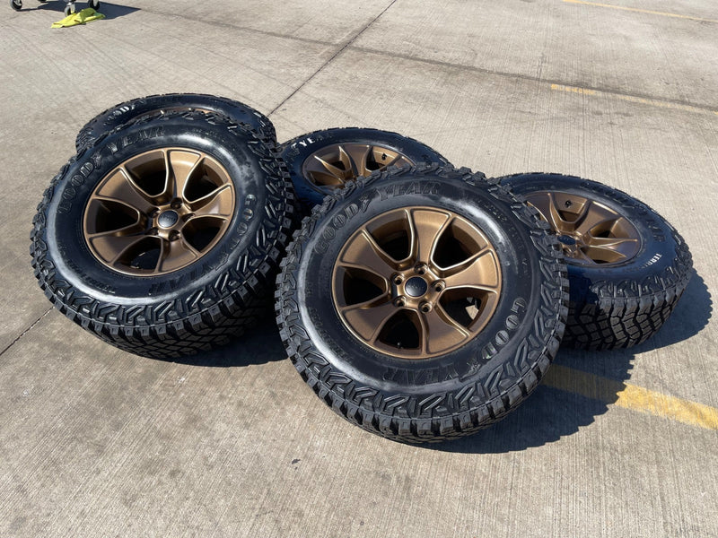 (5) 17" Jeep Wrangler Rubicon OEM 96226 wheels rims Gladiator GOODYEAR 33" NEW Texas Truck Tire