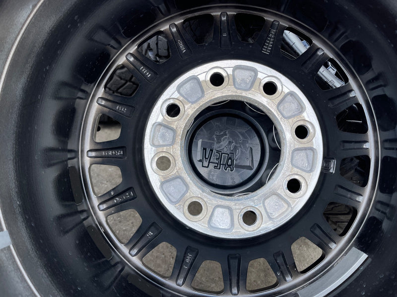 18" AEV SALTA GMC Sierra AT4X Chevy Trail Boss 2500 OEM wheels rims GOODYEAR 35" Texas Truck Tire