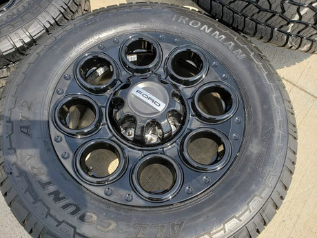 20" Ford F-250 F-350 OEM black TREMOR wheels rims 10299 10484 A/T2 tires NEW Texas Truck Tire