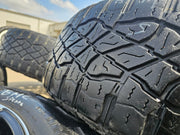 20" GMC Sierra Yukon AT4X Silverado OEM 5914 wheels rims TERRITORY M/T Texas Truck Tire