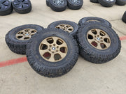 17" Ford Bronco 10384 OEM wheels rims BRONZE tires Ranger 35" M/T Texas Truck Tire