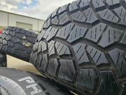 17" Jeep Wrangler Rubicon OEM wheels rims 9216 Gladiator tires A/T Texas Truck Tire