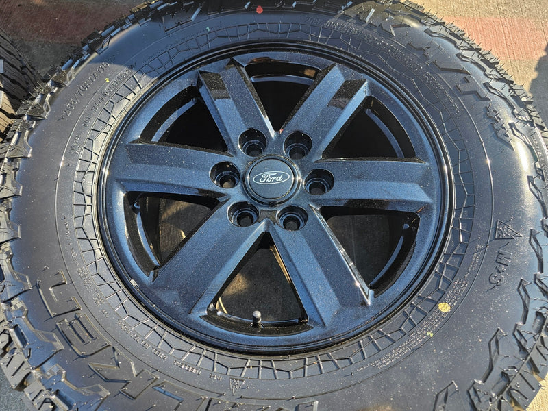 17" Ford F-150 OEM black Tremor rims wheels tires 10339 A/T4 2024 2025 2026 NEW Texas Truck Tire