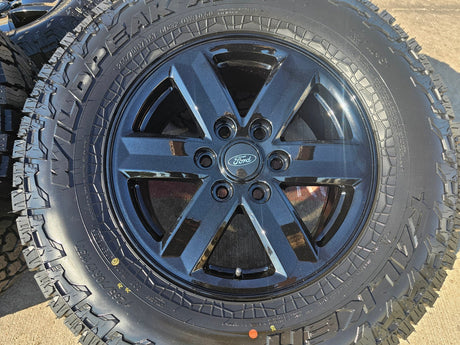 17" Ford F-150 OEM black Tremor rims wheels tires 10339 A/T4 2024 2025 2026 NEW Texas Truck Tire