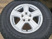 17" Jeep Wrangler Rubicon OEM wheels rims 9216 Gladiator tires A/T Texas Truck Tire