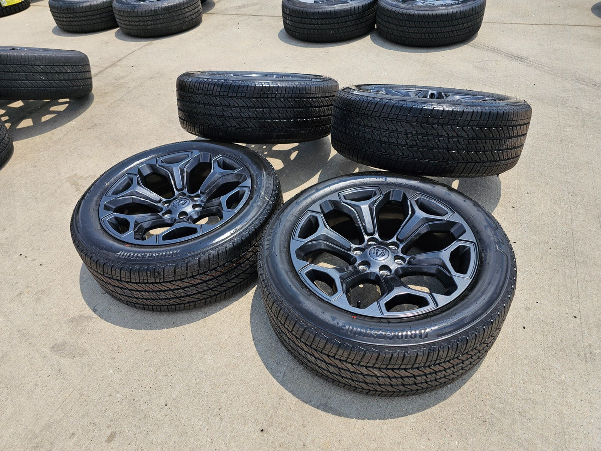 22" Dodge Ram 1500 OEM Laramie wheels LIMITED Gray 2685 2727 tires NEW Texas Truck Tire