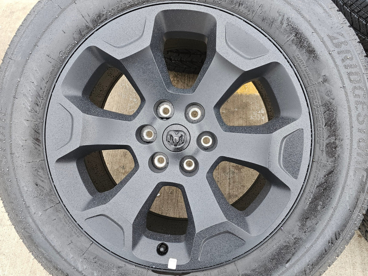 20" Dodge Ram 1500 OEM Laramie Black 2680 wheels rims 2024 2025 2026 BRIDGESTONE Texas Truck Tire
