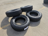 (4) 265/70/18 Cooper Discoverer Snow Claw LT 10 ply load range E tires Texas Truck Tire