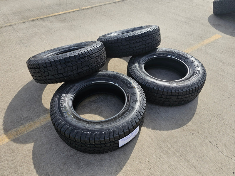 (4) 265/70/18 Cooper Discoverer Snow Claw LT 10 ply load range E tires Texas Truck Tire
