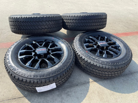 20" Chevy Silverado Trail Boss GMC AT4 2500 OEM 94030 wheels rims NEW A/T Texas Truck Tire