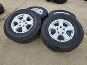 17" Jeep Wrangler Rubicon OEM wheels rims 9216 Gladiator tires A/T Texas Truck Tire