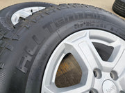17" Jeep Wrangler Rubicon OEM wheels rims 9216 Gladiator tires A/T Texas Truck Tire