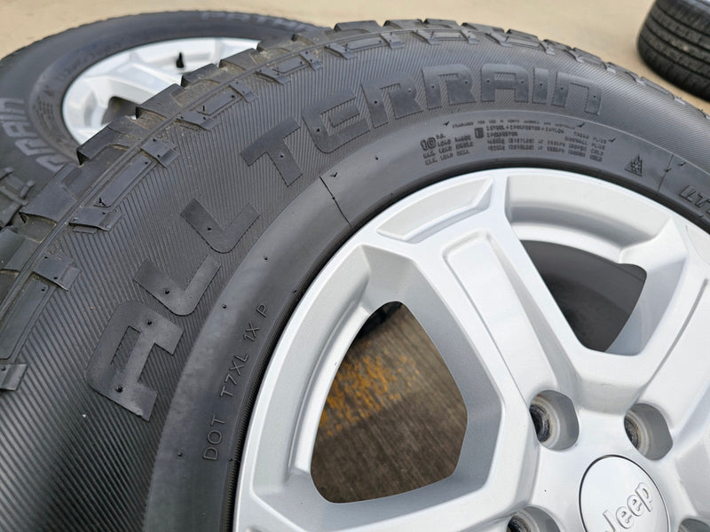 17" Jeep Wrangler Rubicon OEM wheels rims 9216 Gladiator tires A/T Texas Truck Tire