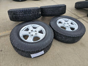 17" Jeep Wrangler Rubicon OEM wheels rims 9216 Gladiator tires A/T Texas Truck Tire