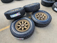 17" 4Runner Toyota Tacoma OEM BRONZE wheels rims FJ FALKEN WILDPEAK A/T4 NEW Texas Truck Tire