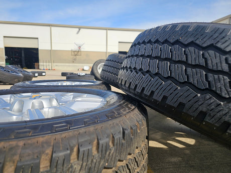 20" GMC Sierra AT4 2500 3500 OEM wheels rims 5950 Silverado BRIDGESTONE DUELER Texas Truck Tire