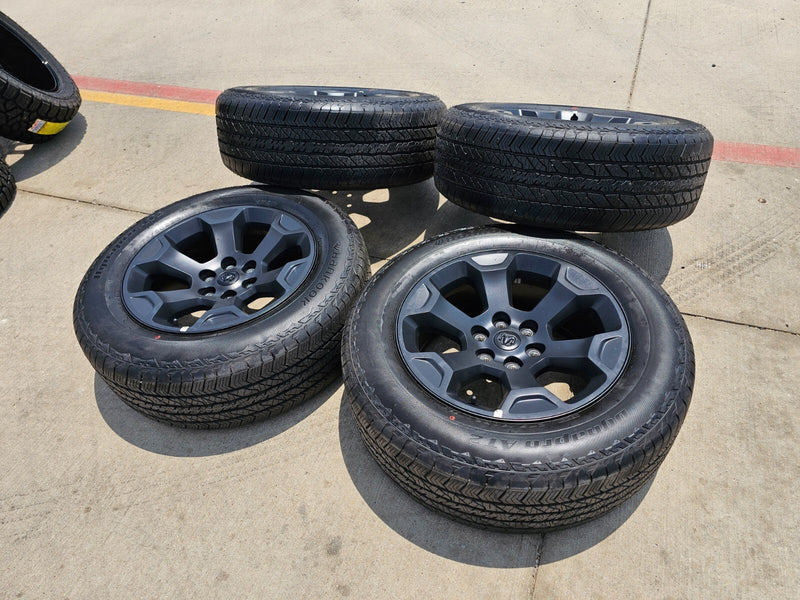 20" Dodge Ram 1500 OEM Laramie Black 2680 wheels rims tires HANKOOK A/T2 NEW Texas Truck Tire