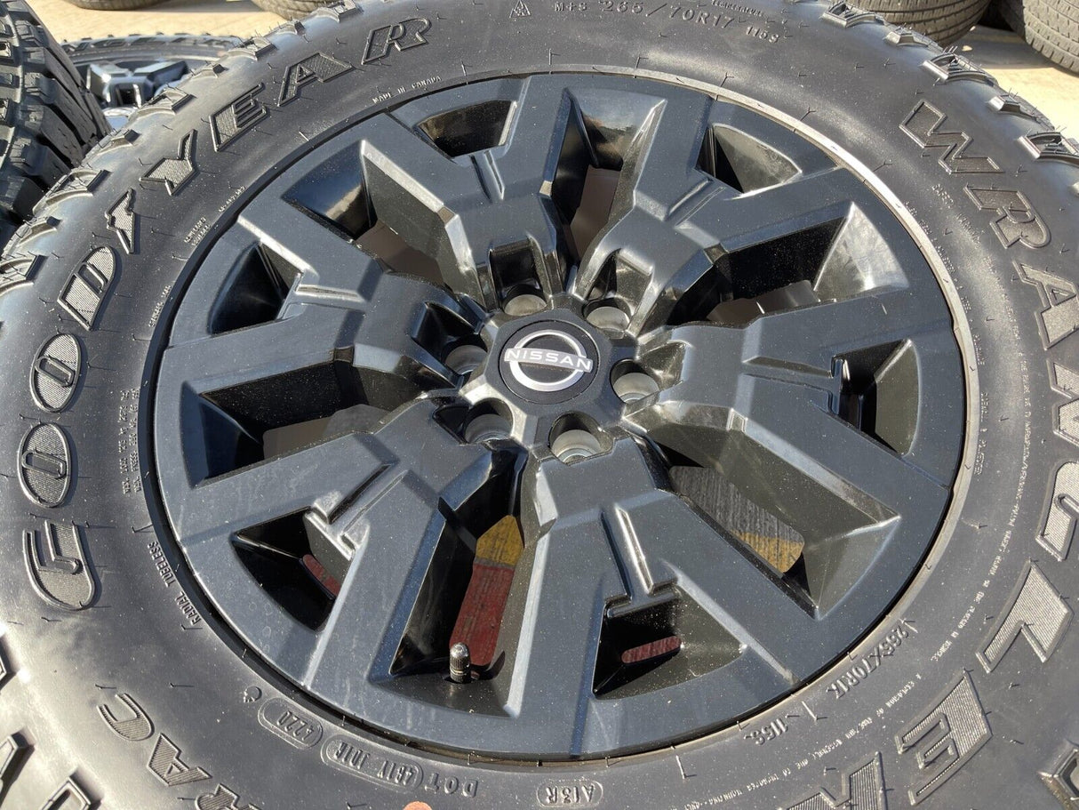 17" Nissan Frontier OEM Desert Runner 62832 wheels rims tires DURATRAC A/T Texas Truck Tire