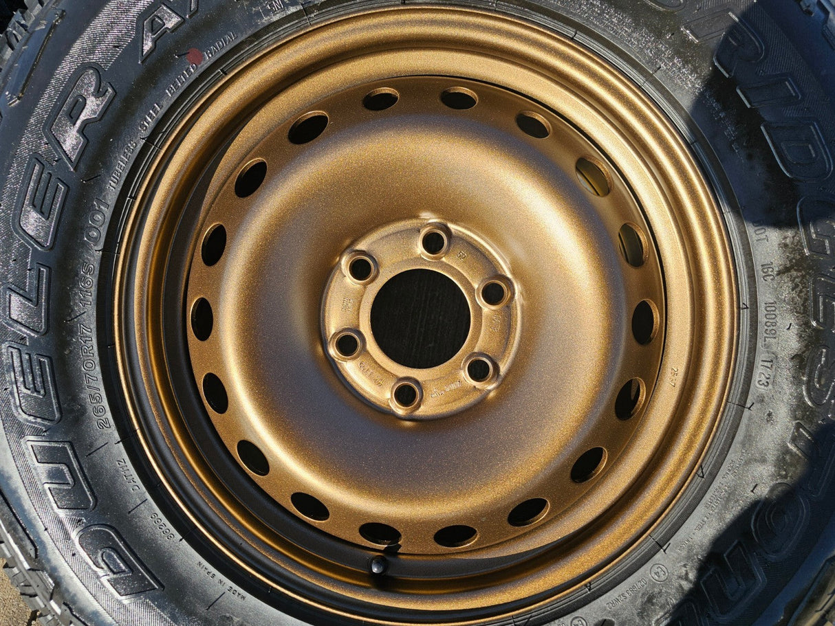 17" INEOS Grenadier OEM steel wheels rims BRONZE tires 2024 2025 2026 NEW Texas Truck Tire