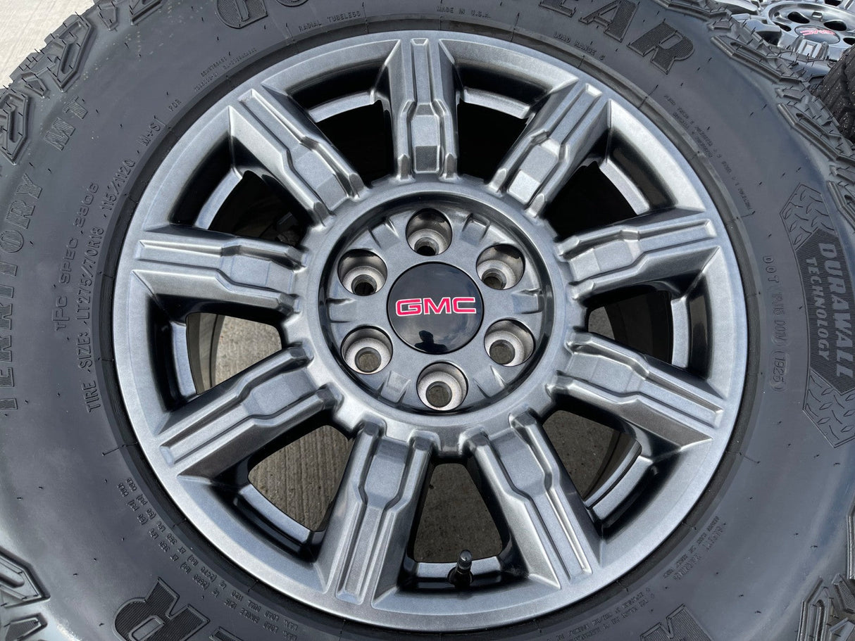 18" GMC Sierra AT4X Chevy Silverado OEM 14131 wheels rims 2025 2026 GOODYEAR M/T Texas Truck Tire