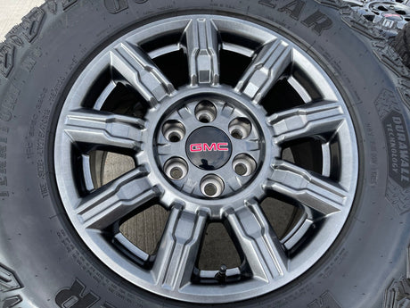 18" GMC Sierra AT4X Chevy Silverado OEM 14131 wheels rims 2025 2026 GOODYEAR M/T Texas Truck Tire
