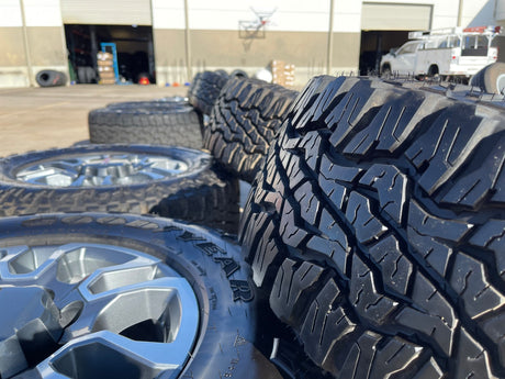 18" GMC Sierra AT4X Chevy Silverado 2500 3500 OEM 5949 wheels rims GOODYEAR A/T Texas Truck Tire