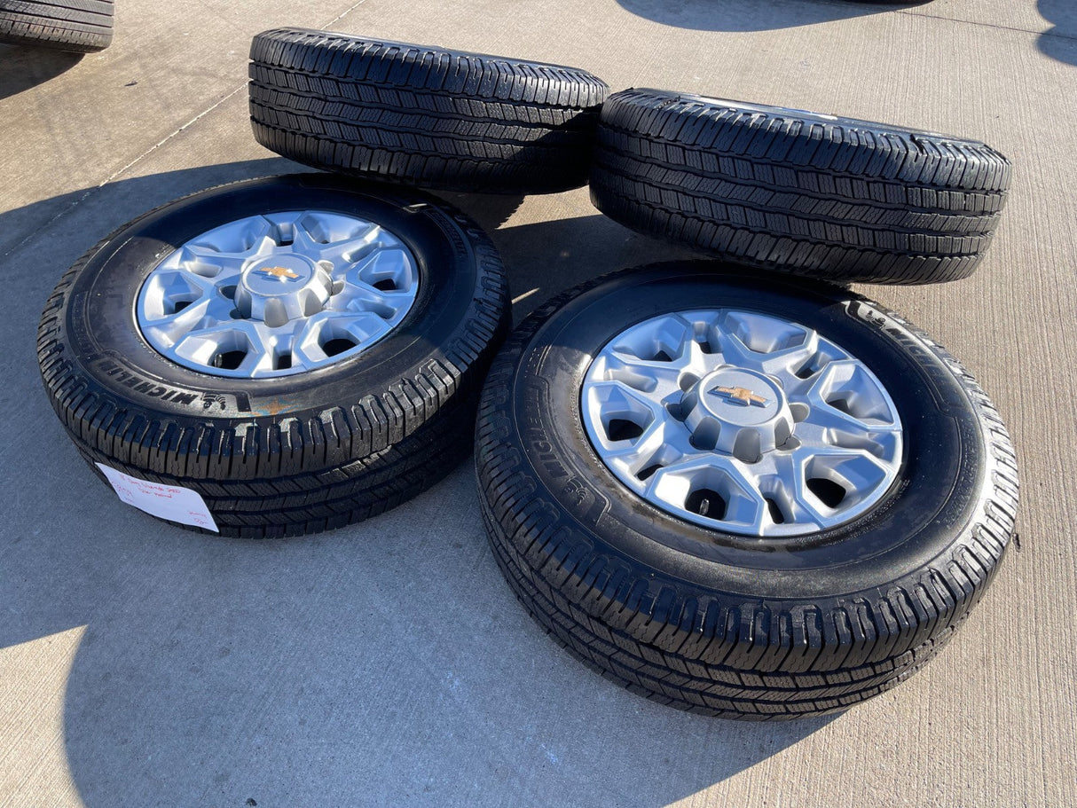 18" Chevy Silverado 2500 3500 OEM 5959 wheels rims MICHELIN DEFENDER LTX M/S2 Texas Truck Tire