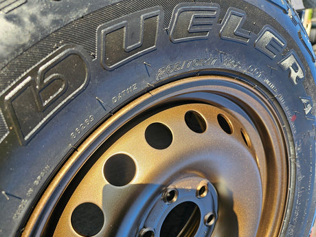 (4) 17" INEOS Grenadier OEM steel wheels rims BRONZE tires 2024 2025 2026 NEW Texas Truck Tire
