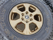 17" Ford Bronco 10384 OEM wheels rims BRONZE tires Ranger 35" M/T Texas Truck Tire