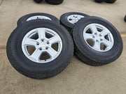 17" Jeep Wrangler Rubicon OEM wheels rims 9216 Gladiator tires A/T Texas Truck Tire