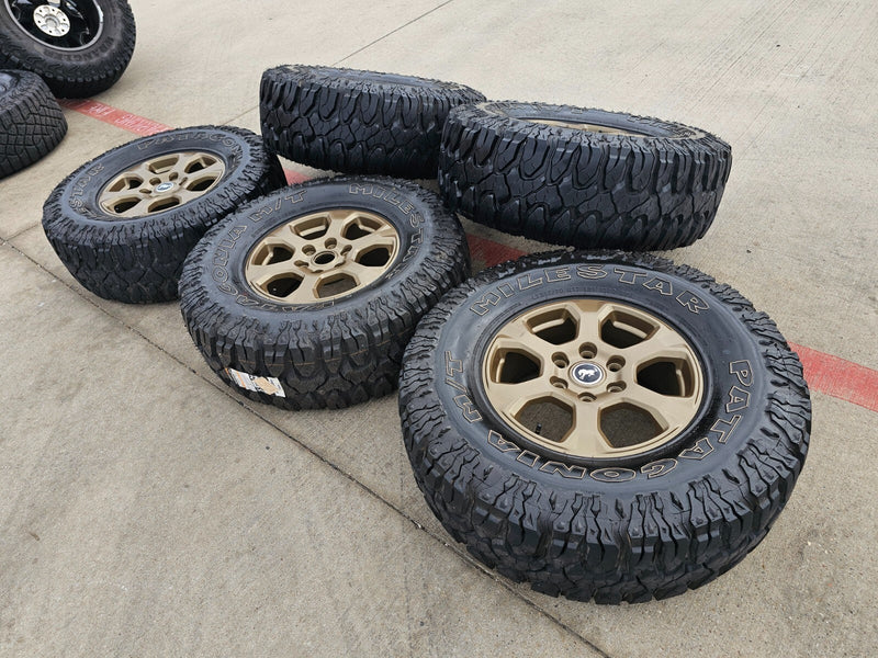 17" Ford Bronco 10384 OEM wheels rims BRONZE tires Ranger 35" M/T Texas Truck Tire