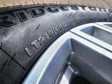 20" GMC Sierra AT4 2500 3500 OEM wheels rims 5950 Silverado BRIDGESTONE DUELER Texas Truck Tire