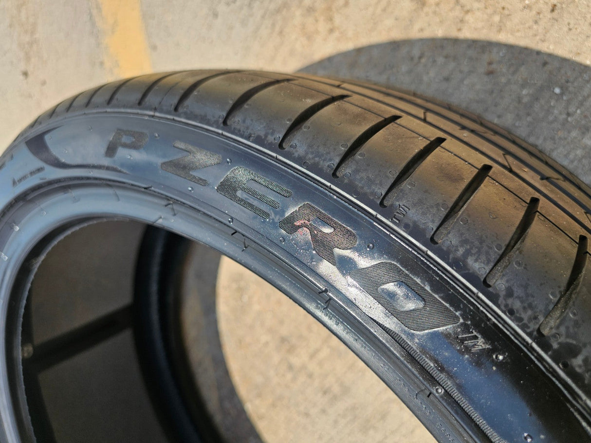 (1) 265/35/21 Pirelli P Zero tire Elect LM1 NEW take off! Texas Truck Tire