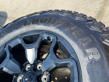 18" Dodge Ram 1500 TRX RHO Black OEM 66002 wheels rims TERRITORY M/T 35" Texas Truck Tire