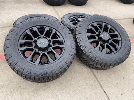 20" Chevy Silverado Trail Boss GMC AT4 2500 OEM 94030 wheels rims NIRTO 34" Texas Truck Tire