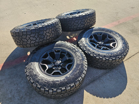 18" Dodge Ram 1500 TRX RHO Black OEM 66002 wheels rims TOYO A/T3 35" Texas Truck Tire