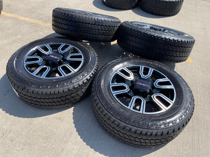 20" GMC Sierra AT4 2500 3500 OEM wheels rims 5950 Silverado BRIDGESTONE A/T Texas Truck Tire