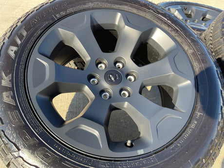 20" Dodge Ram 1500 OEM Laramie Black 2680 wheels rims 2025 2026 FALKEN A/T3 NEW Texas Truck Tire