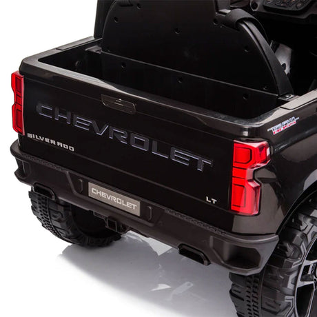 Black Chevy Silverado 4x4 Trail Boss Monster Truck Ride-On with Big Wheels